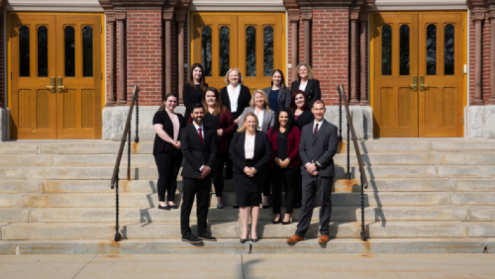 Katherine J. Morneau with her team