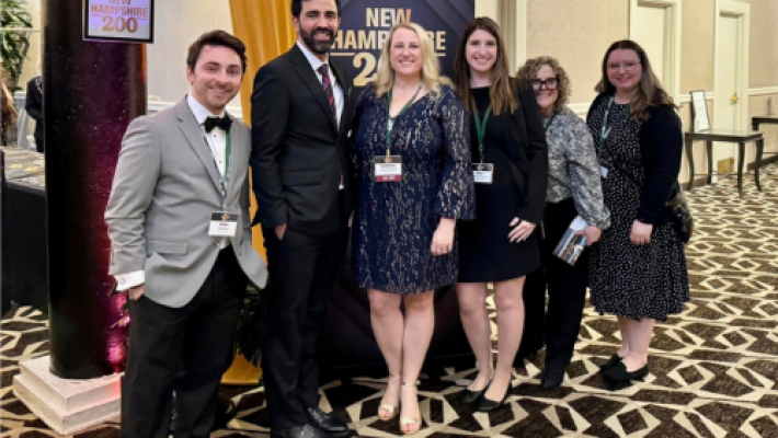 Katherine J. Morneau with team