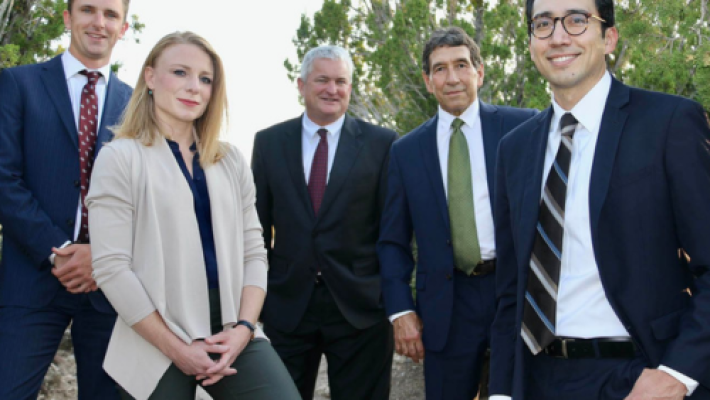 Kelly Stout Sanchez with team