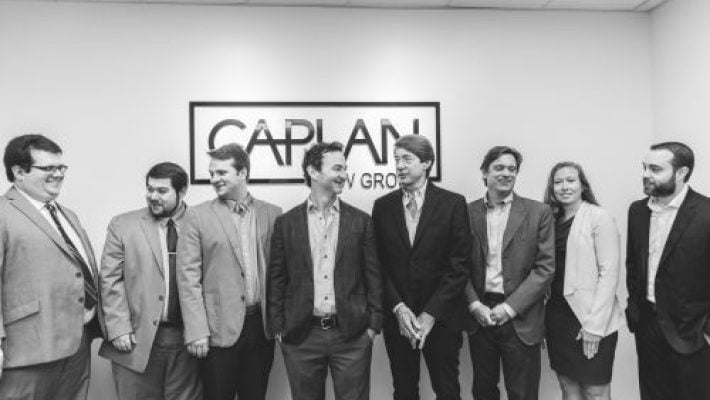 L.T. Caplan & His Firm Members