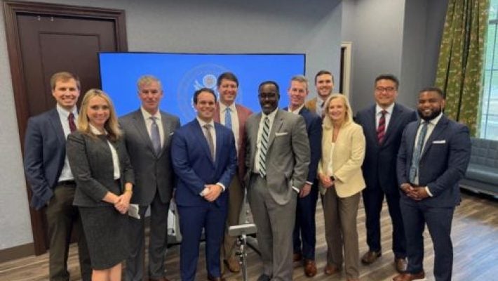 Larry Golston with team