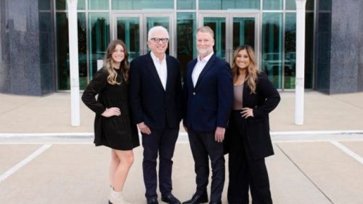 Larry S. Klein with team