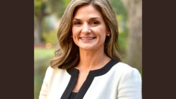 Laura M. Coker Solo