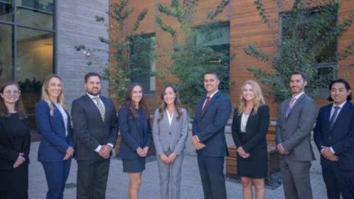 Laurence I. Gendelman With Team