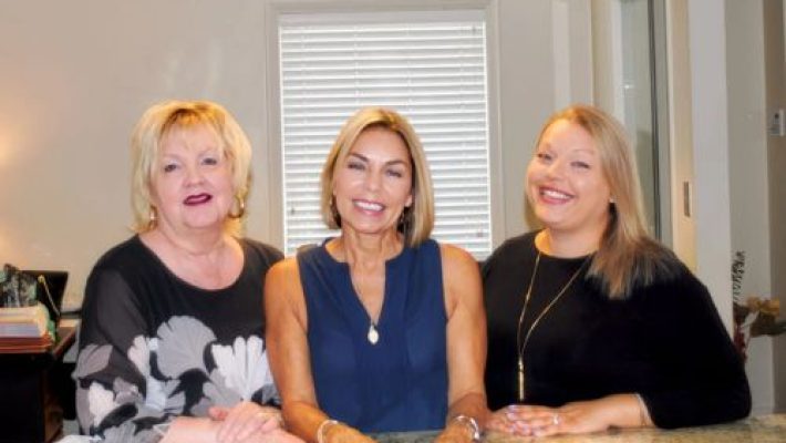 Laurie Baiden Bumb with team