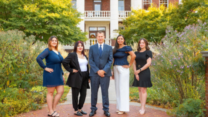 Lee L. Marvin with team