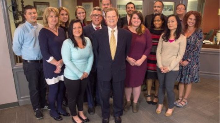 Lori L. Szathmary With Team