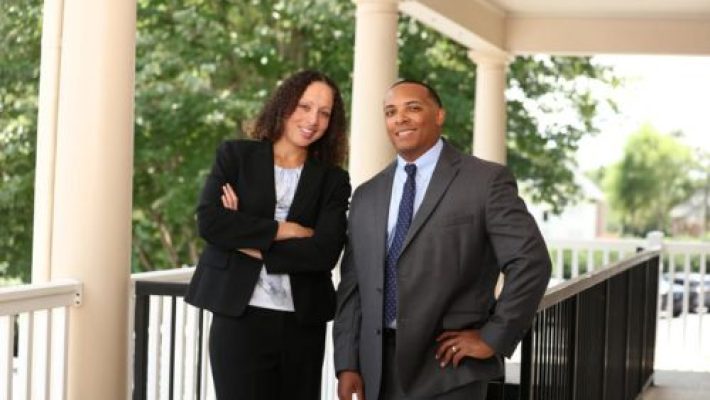 Louise N. Smith with team