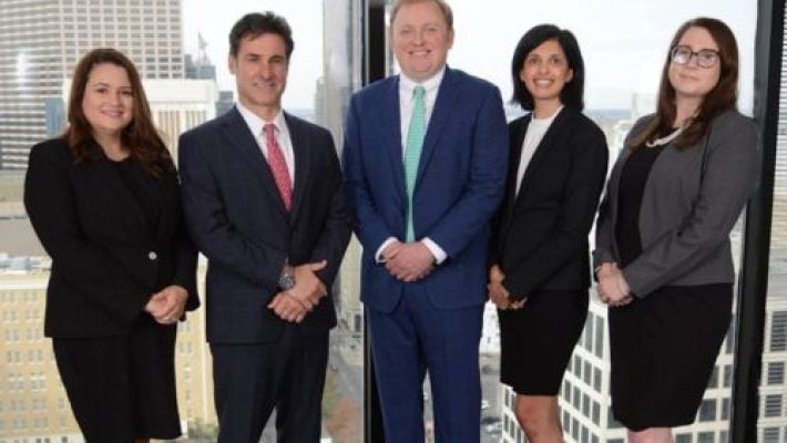 Marc D. Winsberg with team