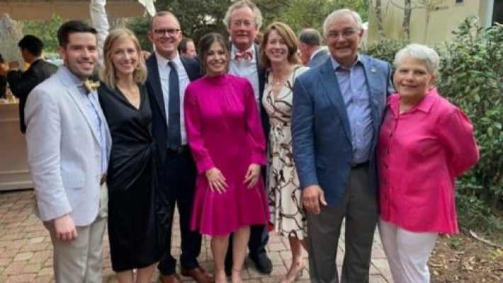 Marguerite L. Adams With Team