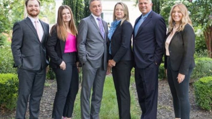 Martha G. Norton with team