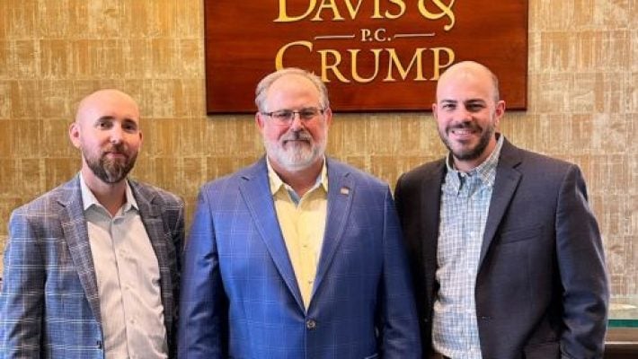 Martin D. Crump with his team
