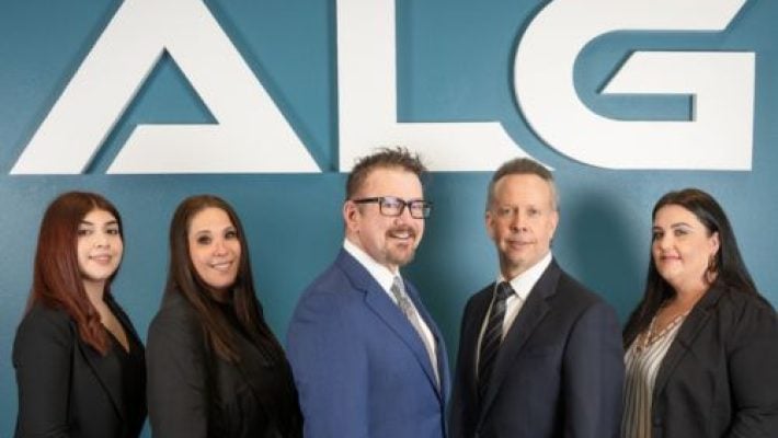 Matthew E. Aaron with team