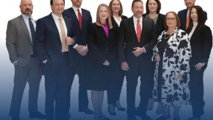 Michael A. DeMayo with team