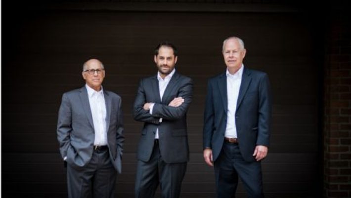 Michael J. Duber with team