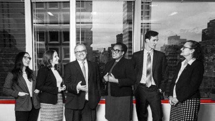 Michael S. Adler with team