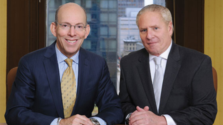 Mitchell J. Sassower with partner