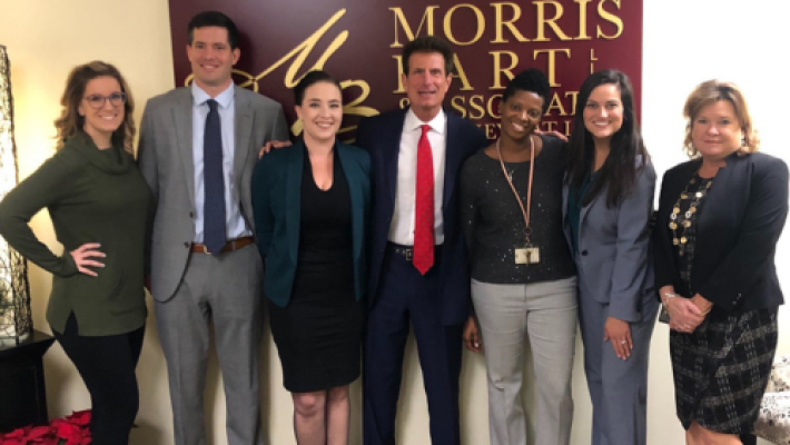 Morris Bart with team