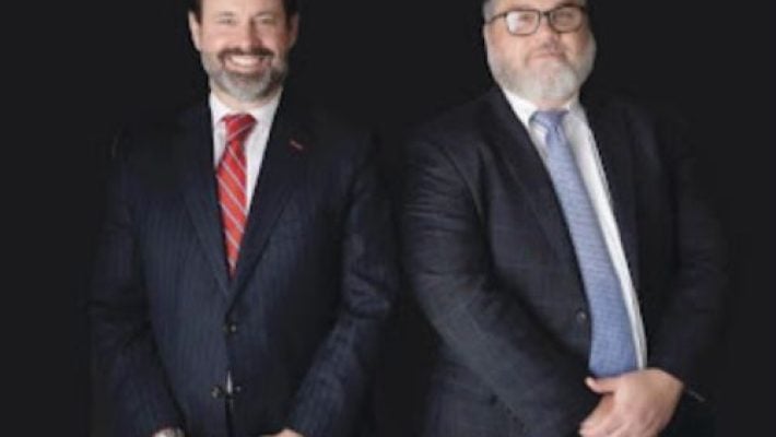 Nathan H. Elmore With Partner