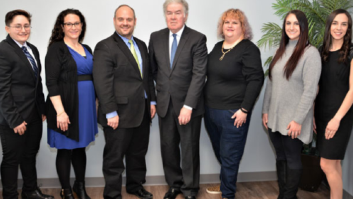 Neil A. Pawlowski with team