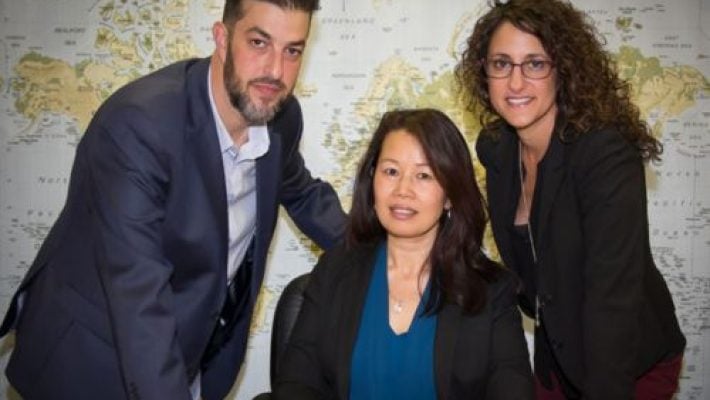 Nicole A. Murad with team