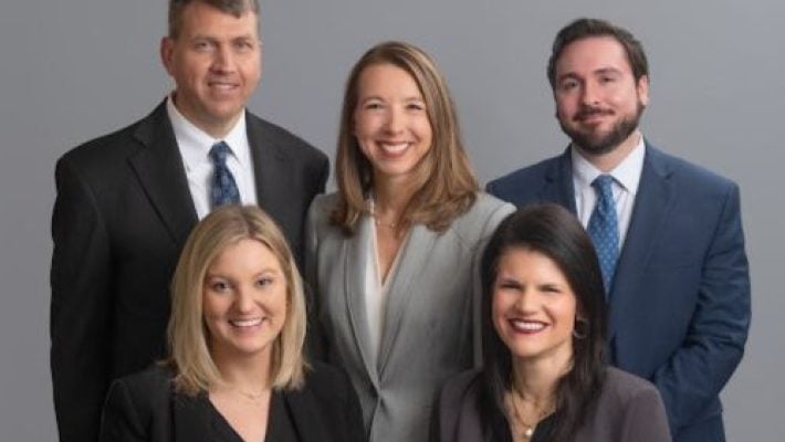 P. James Rainey With Team