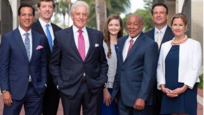 Patrick M. Regan with team