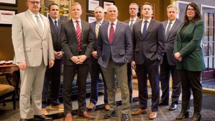 Patrick O. Dunphy With Team