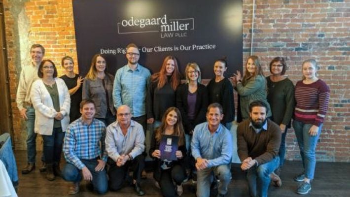 Paul D. Odegaard with team