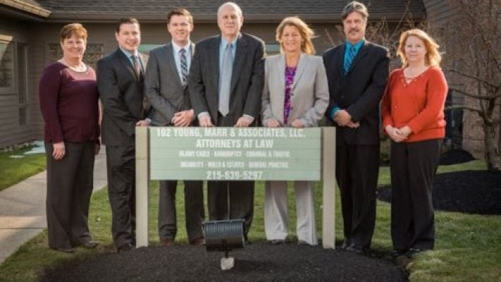 Paul H. Young With Team