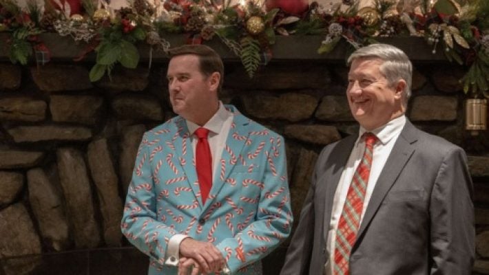 Paul W. Carey with team