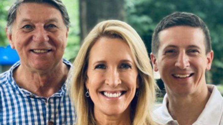 Perry A. Coumas With Team