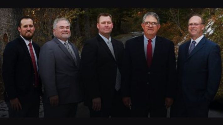 Peter M. Wells with team