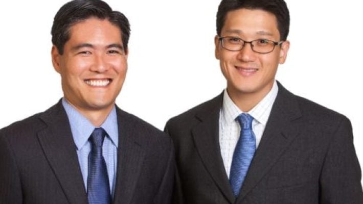 RAYMOND C. CHO with team