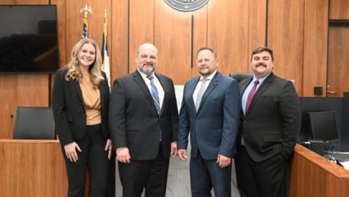 Randall L. Jackson with team