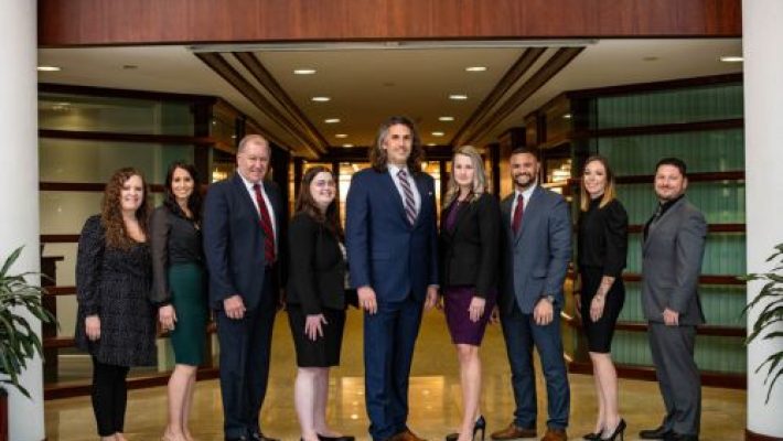 Rebecca Melone with team