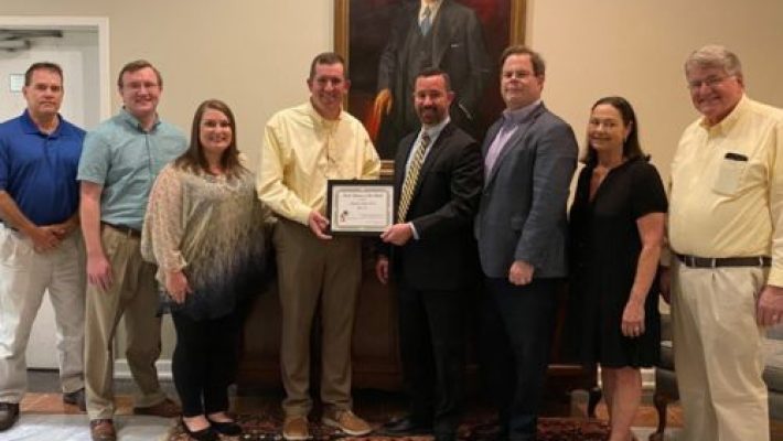 Rick A. La Trace with team