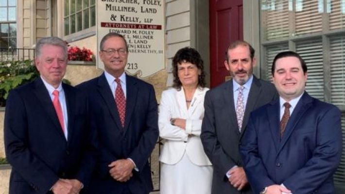 Robert M. Abernethy, III with team