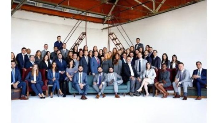 Robert T. Simon with team
