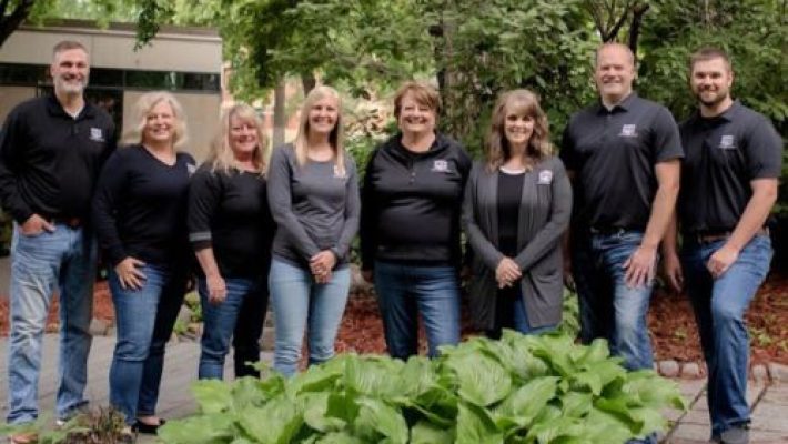 Russell R. Cherne With Team