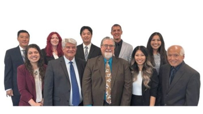 Shannon Kim Hackett With Colleagues