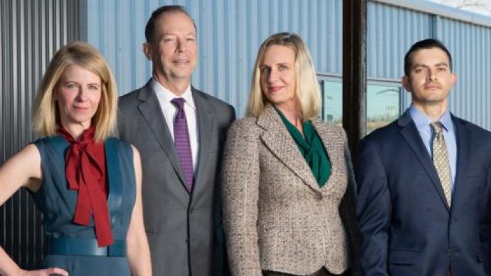 Shannon L. Kennedy with team