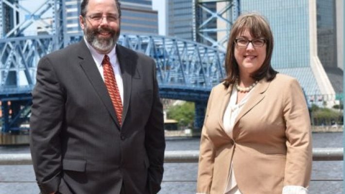 Steven P. Combs with Colleague