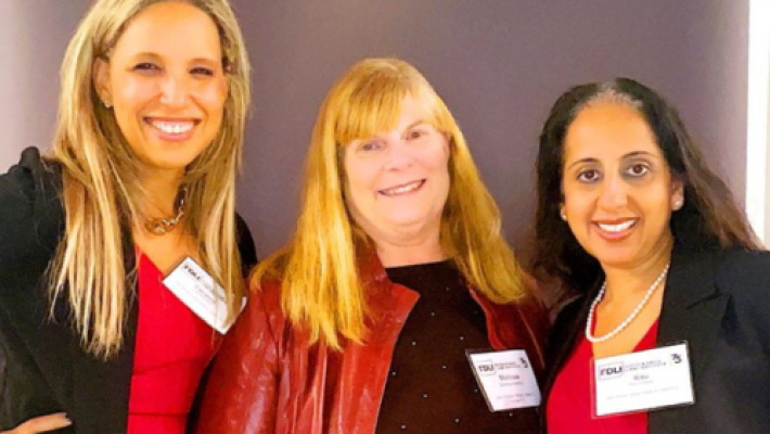 Susan E. Groff with team