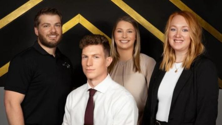 Taylor G. Esch with team