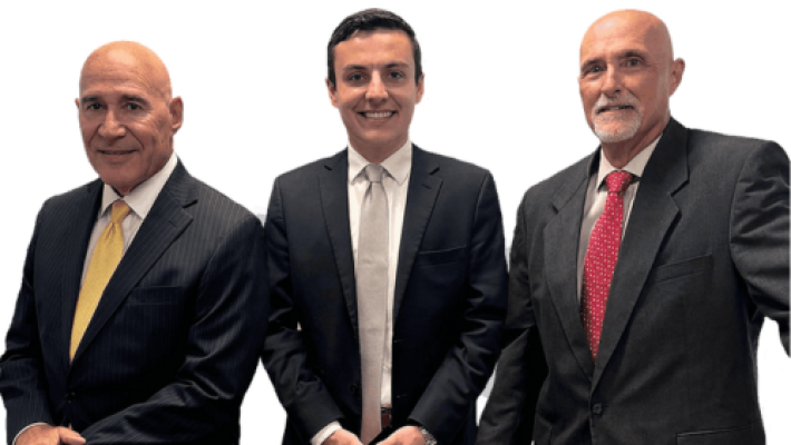 Thomas C. Damico with team