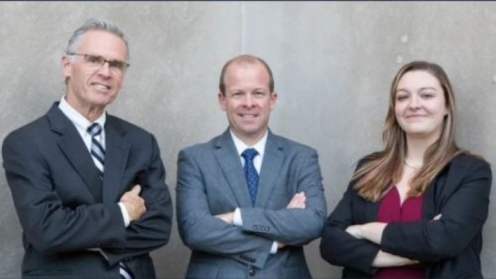 Tom Brosnan with team