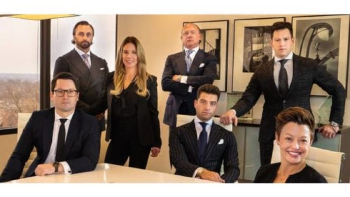 Travis L. Noble Jr. with team